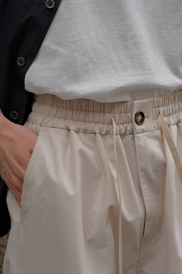 Knee Pleat Slouch Trousers